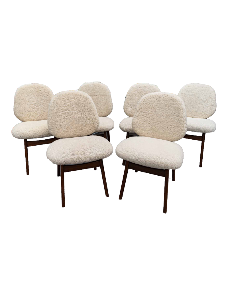 Set of 6 Danish teak chairs covered with bouclé sheepskin fabric.