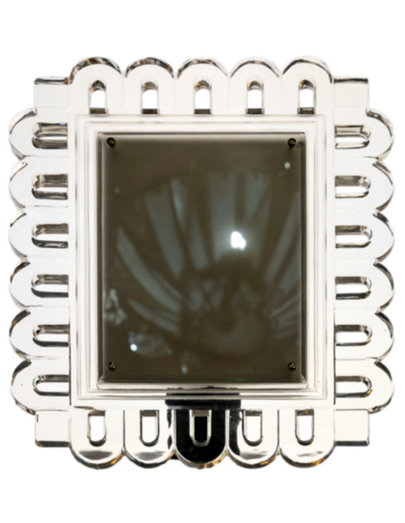 Circa 1950, Lalique crystal, frame decorated with scrolls.