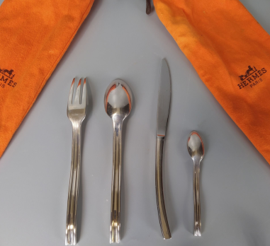 HERMÈS PARIS — “Ondes” flatware set,...