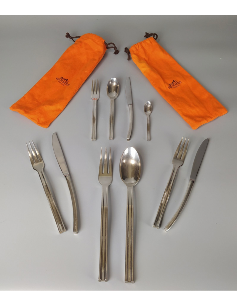 HERMÈS PARIS — “Ondes” flatware set, 98 pieces in its cases